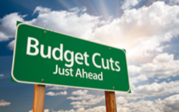 budget cuts sign