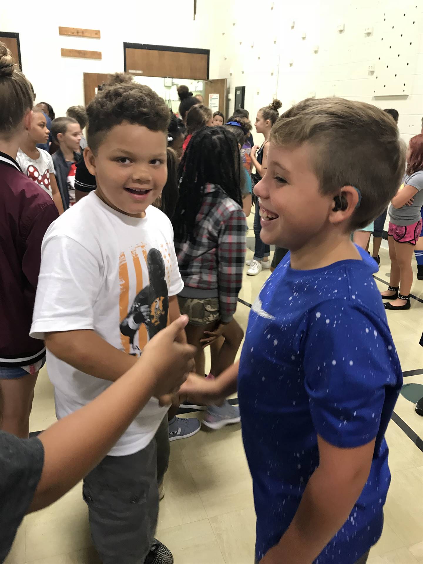 Boys greeting one another