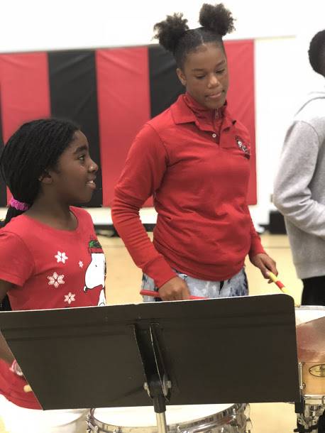 Students playing trumpet