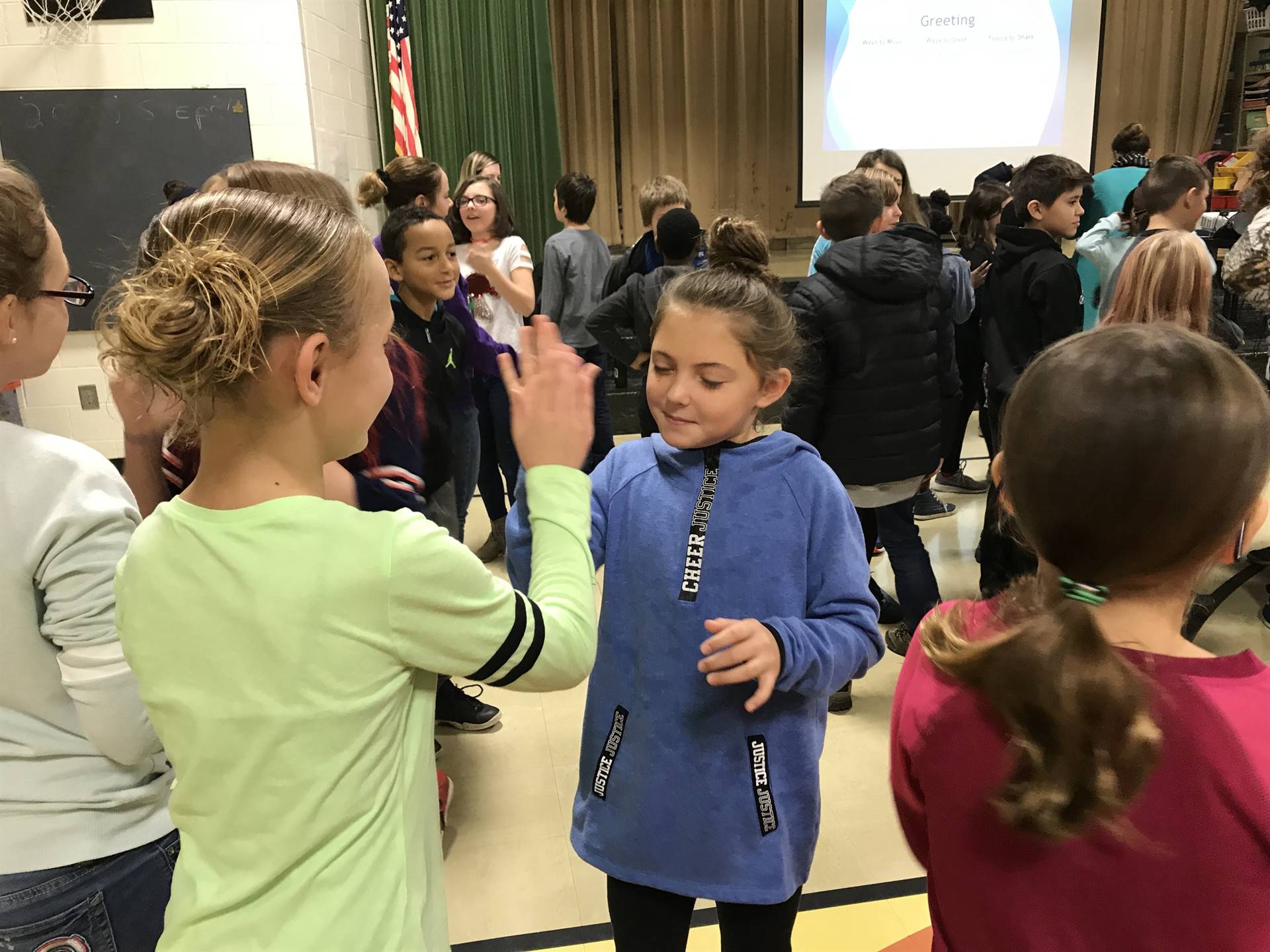 children greeting each other