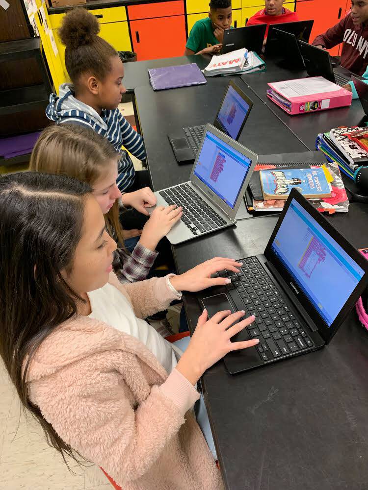 students working at computer