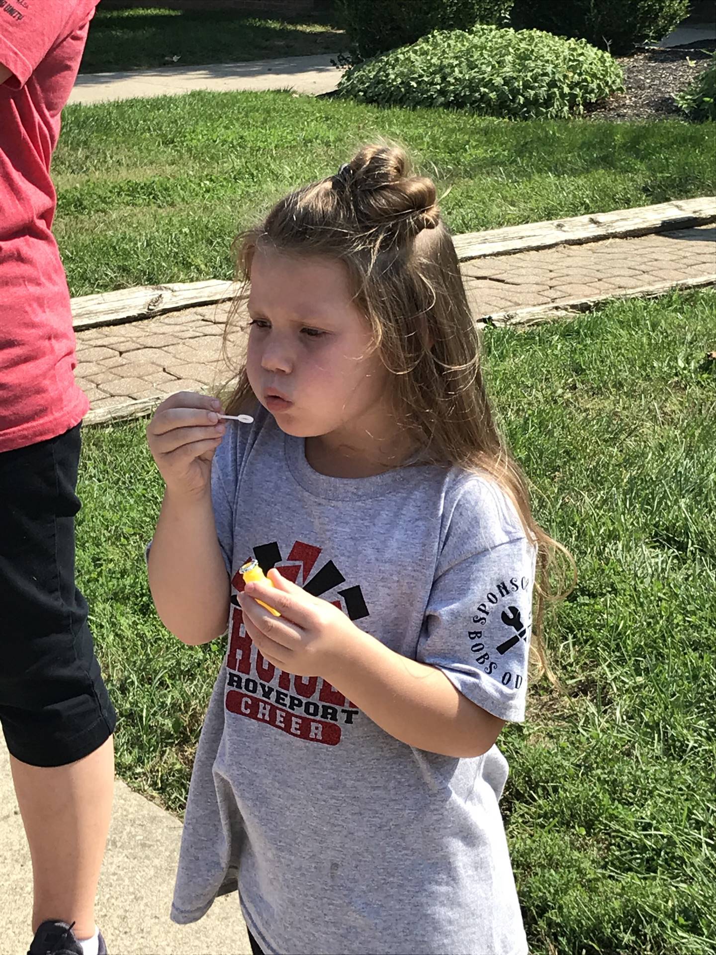 Girl blowing bubbles