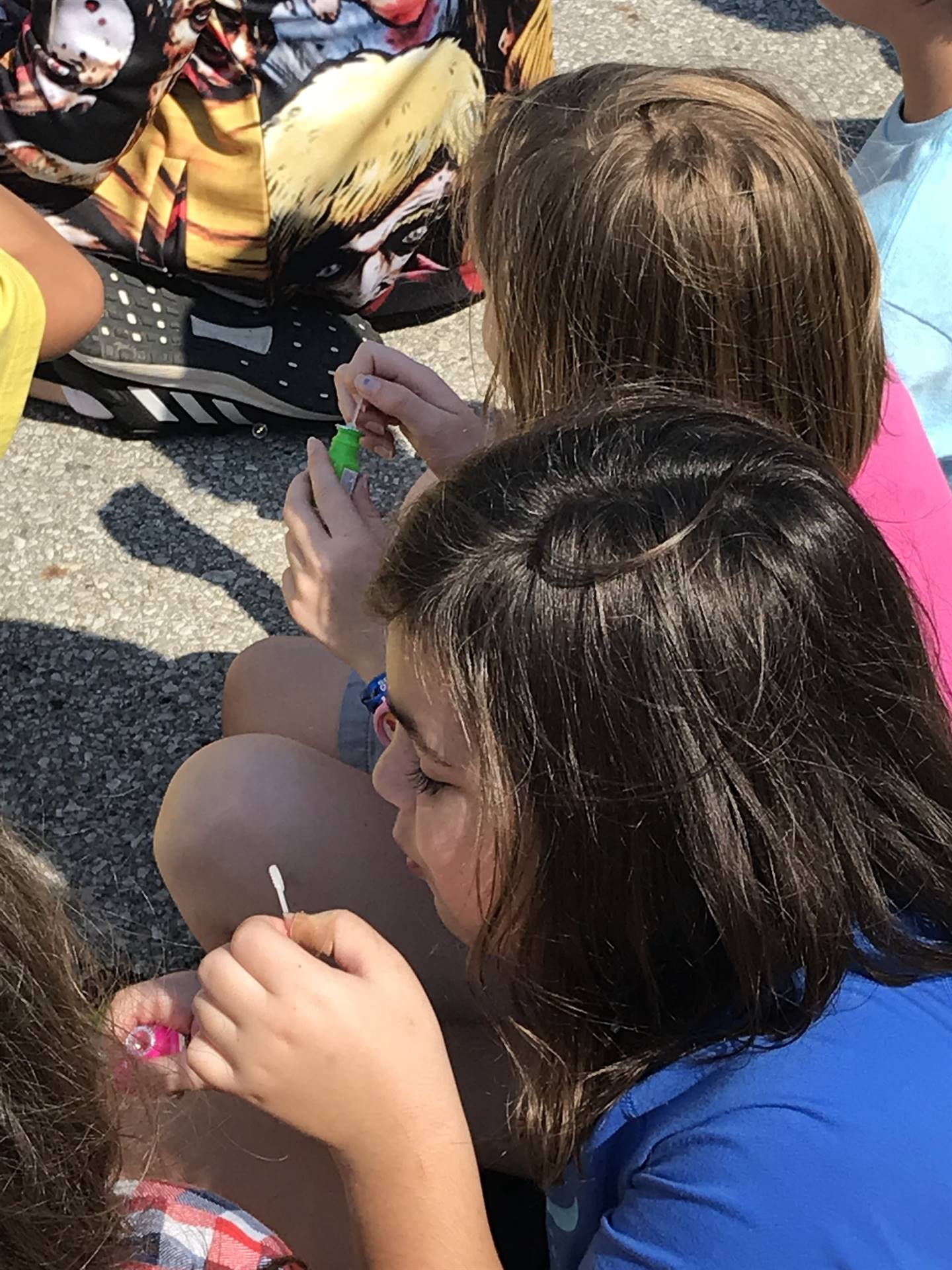 Children blowing bubbles