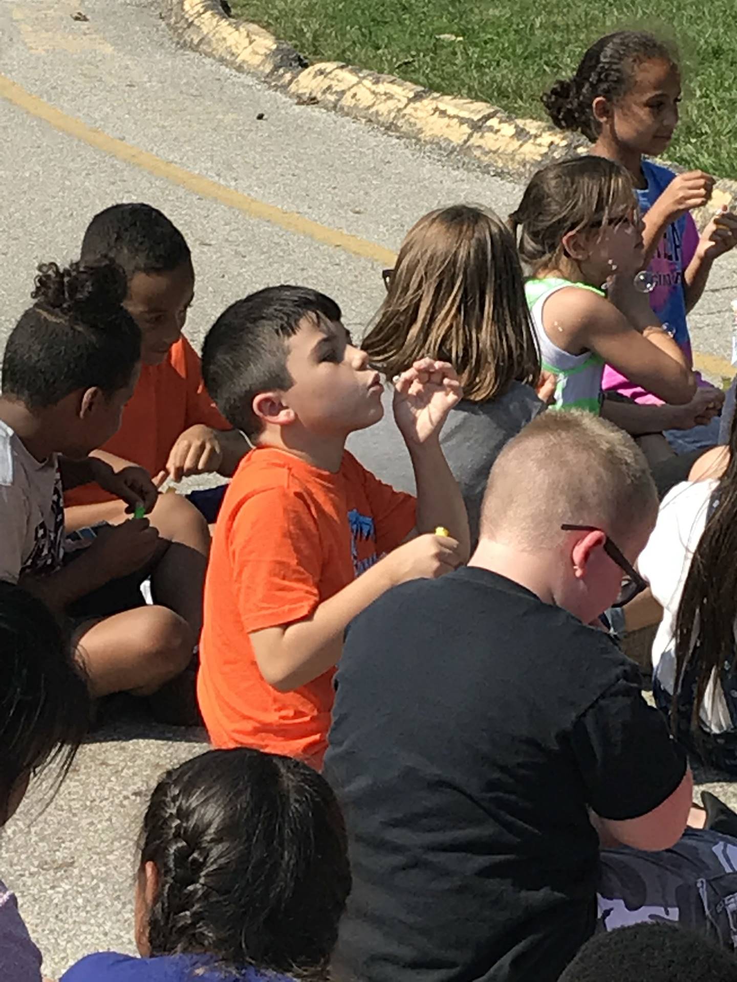 Children blowing bubbles