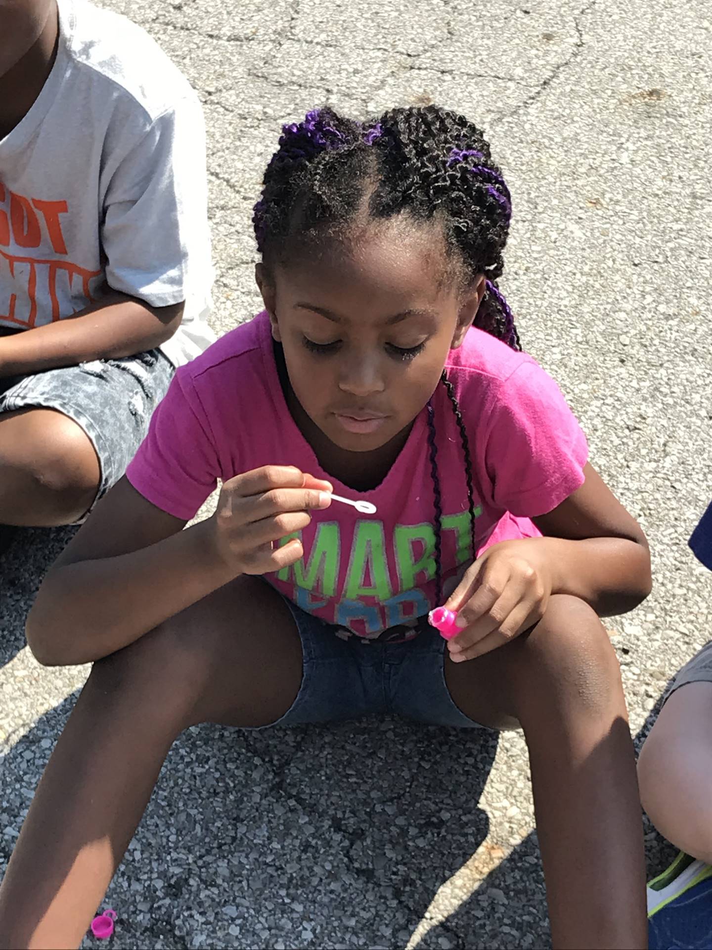 Girl blowing bubbles