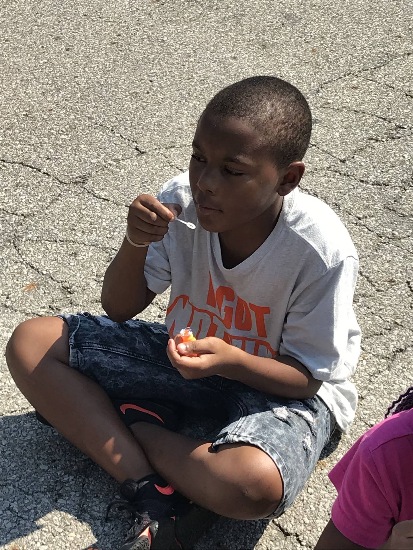 Boy blowing bubbles