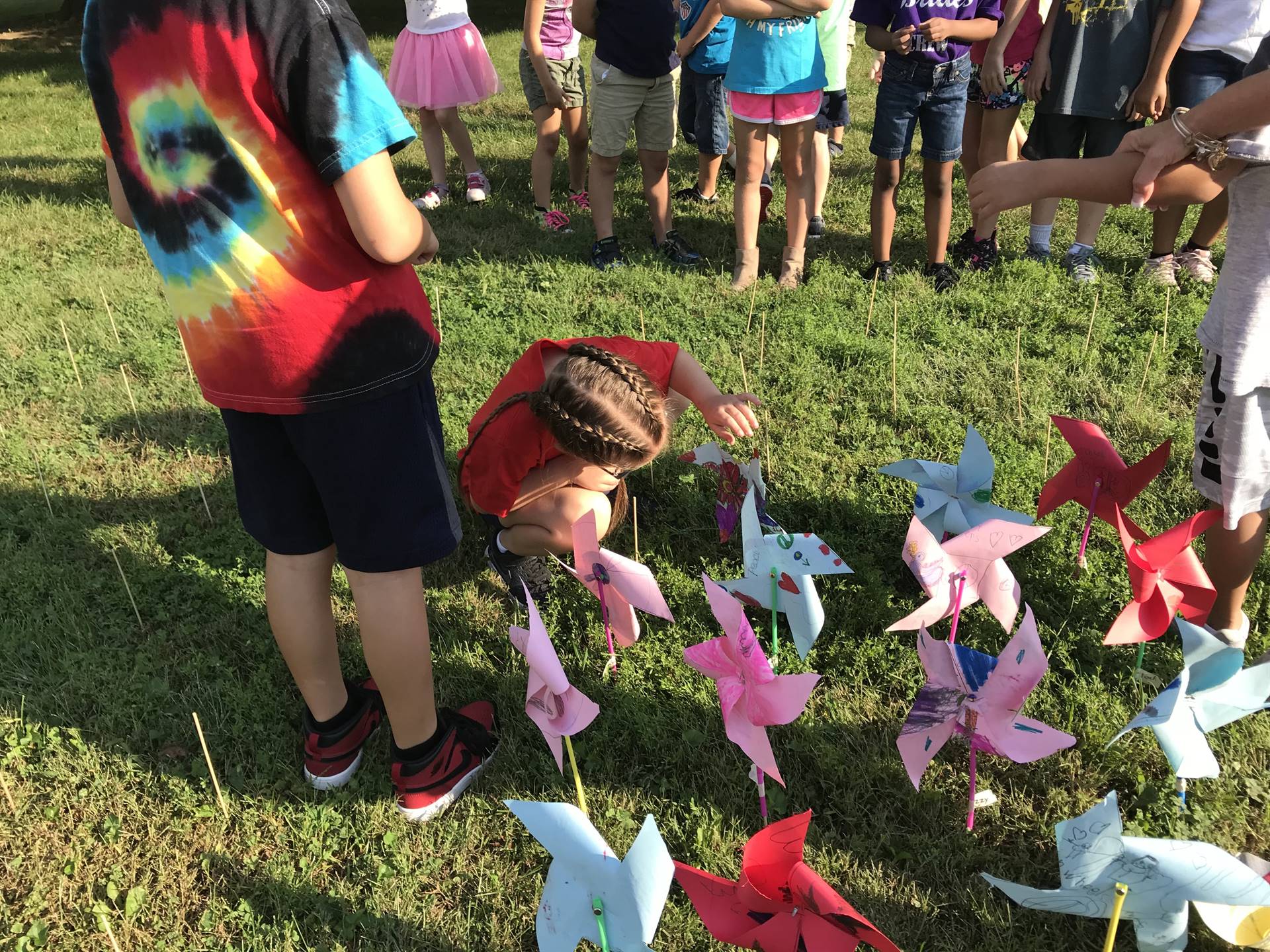 Girl placing pinwheel