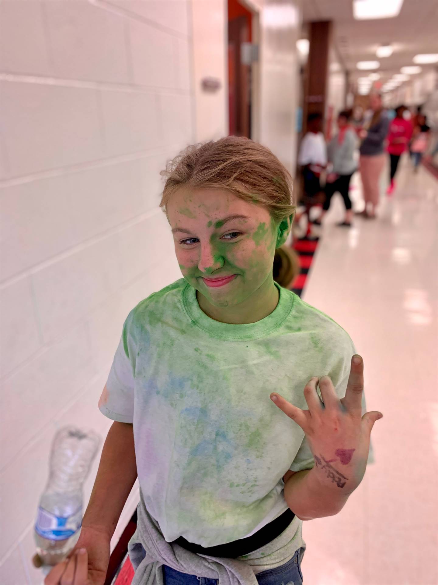 student posing after color walk