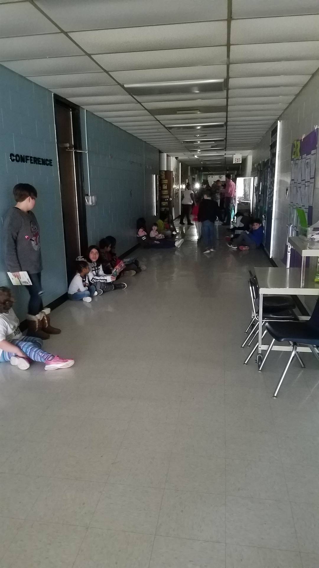 Reading in the hallway