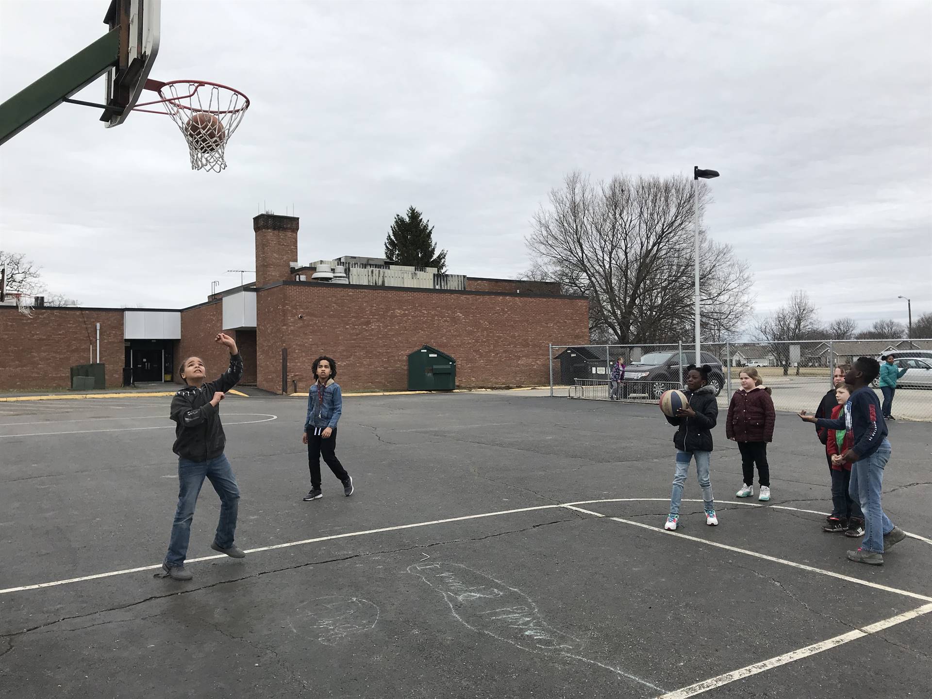 Playing basketball