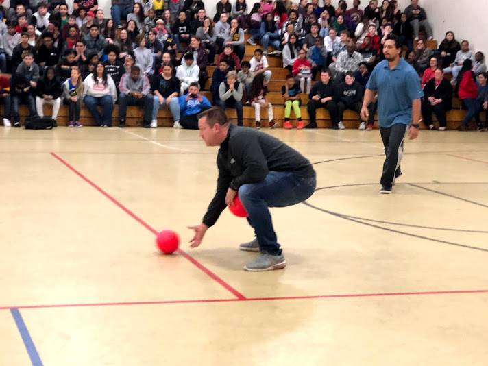 staff member playing dodgeball