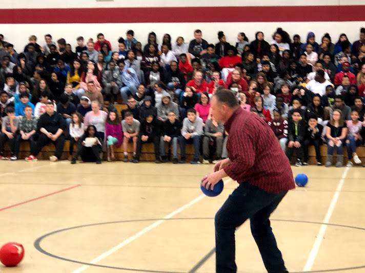 staff member playing dodgeball