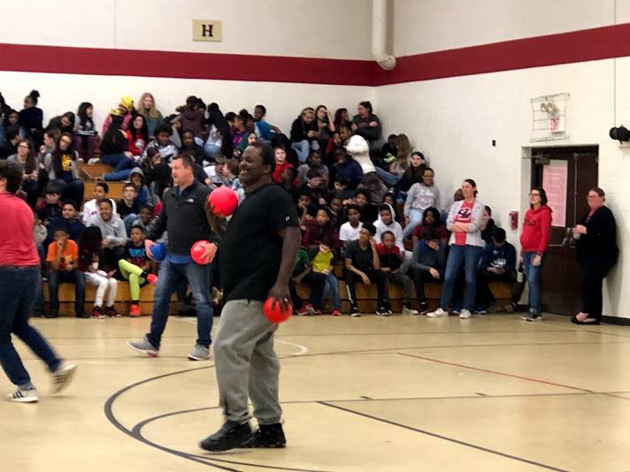 staff member playing dodgeball