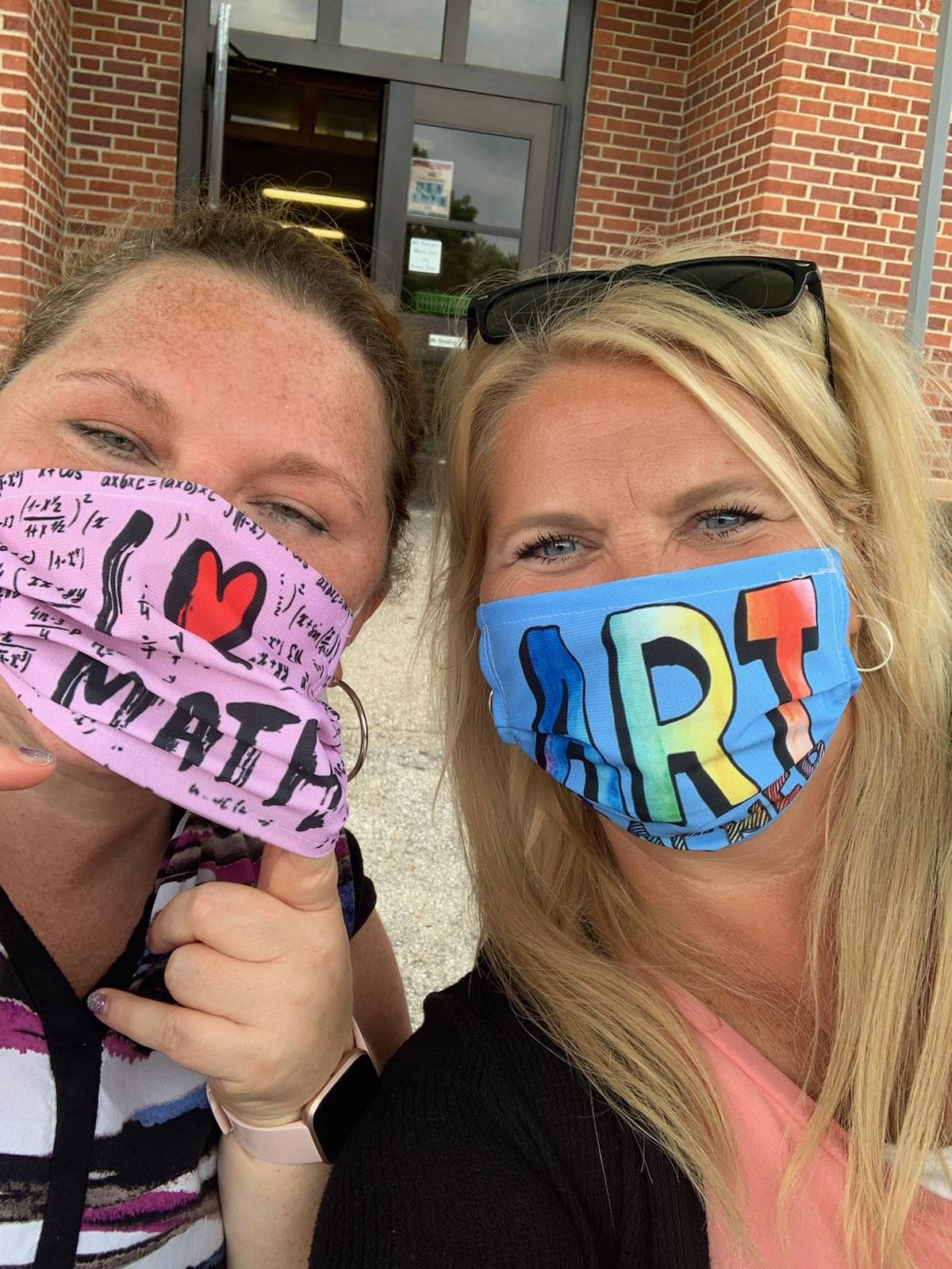 Mrs. Cox and Ms. Williamson wearing masks