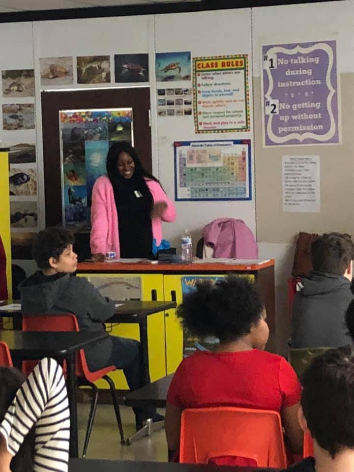 Student wearing firefighter gear