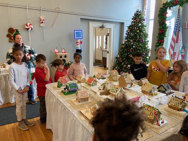 Students visiting the Town Hall Gingerbread display 