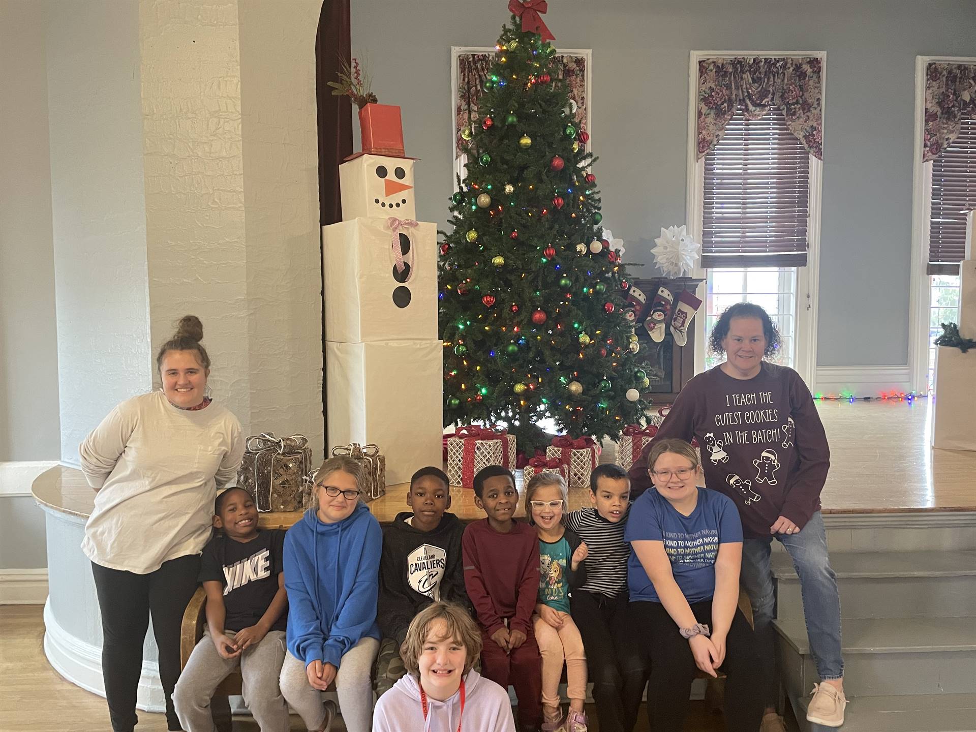 Students visiting the Town Hall Gingerbread display 