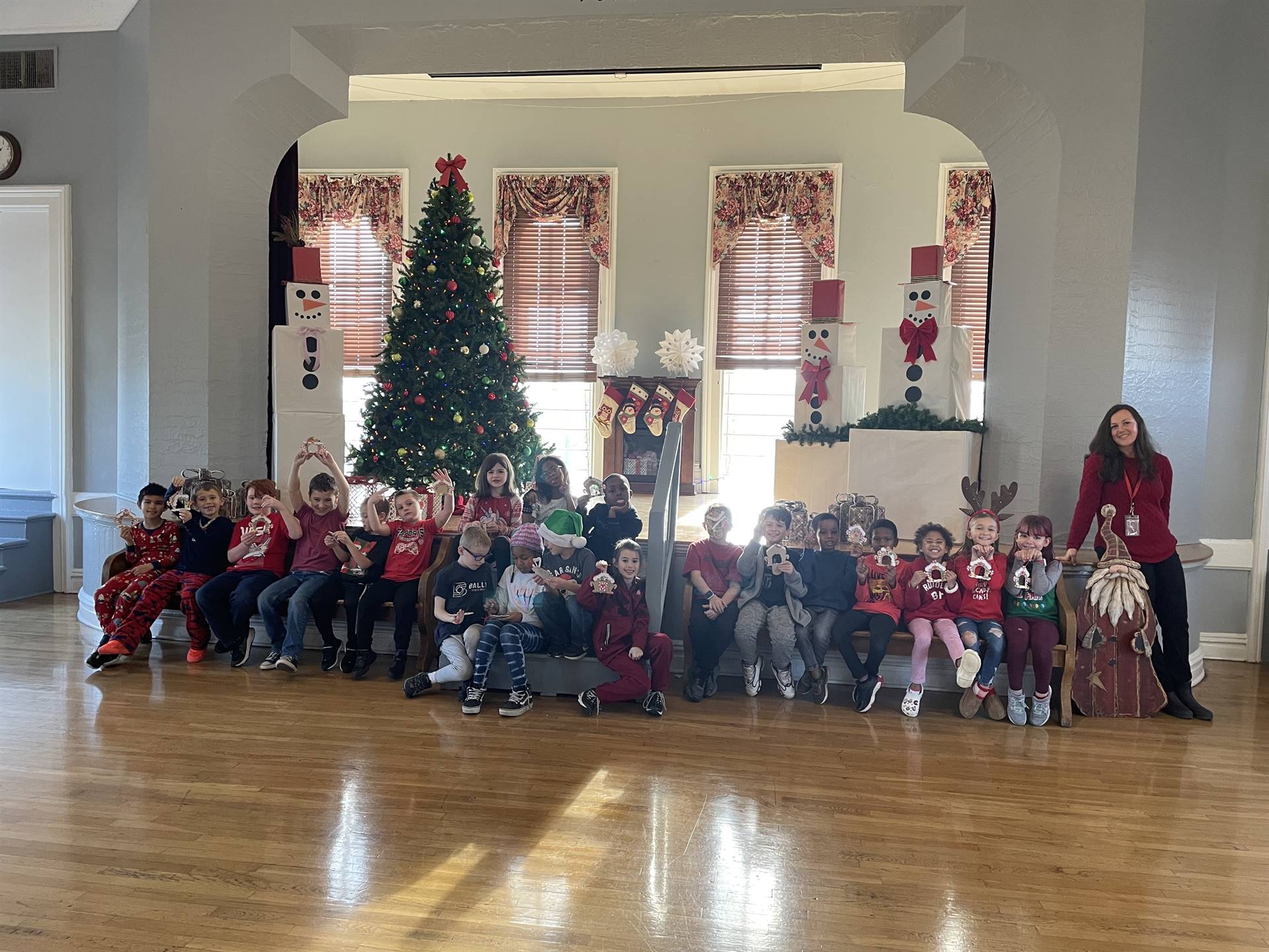 Students visiting the Town Hall Gingerbread display 