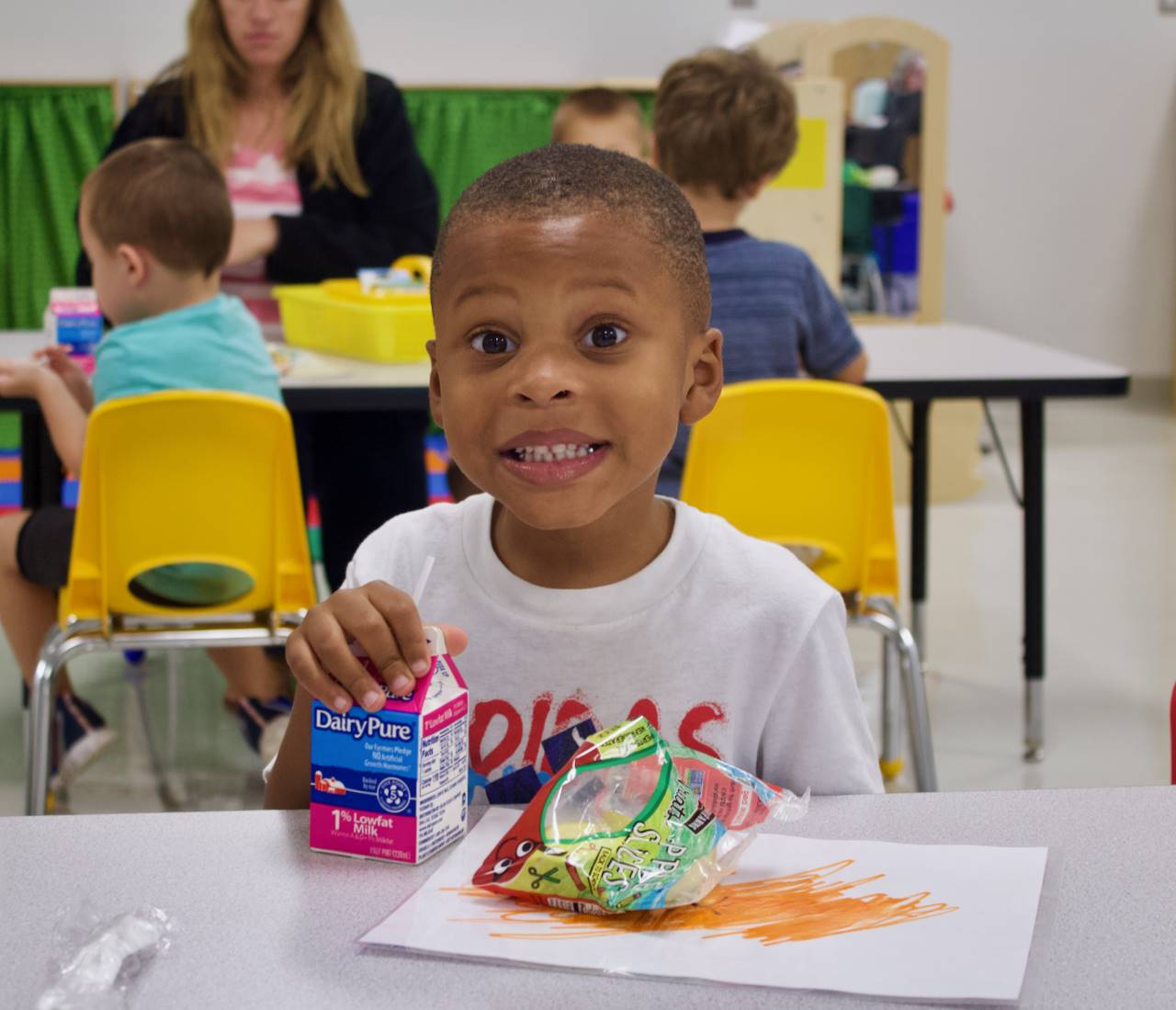 preschool boy eating snack