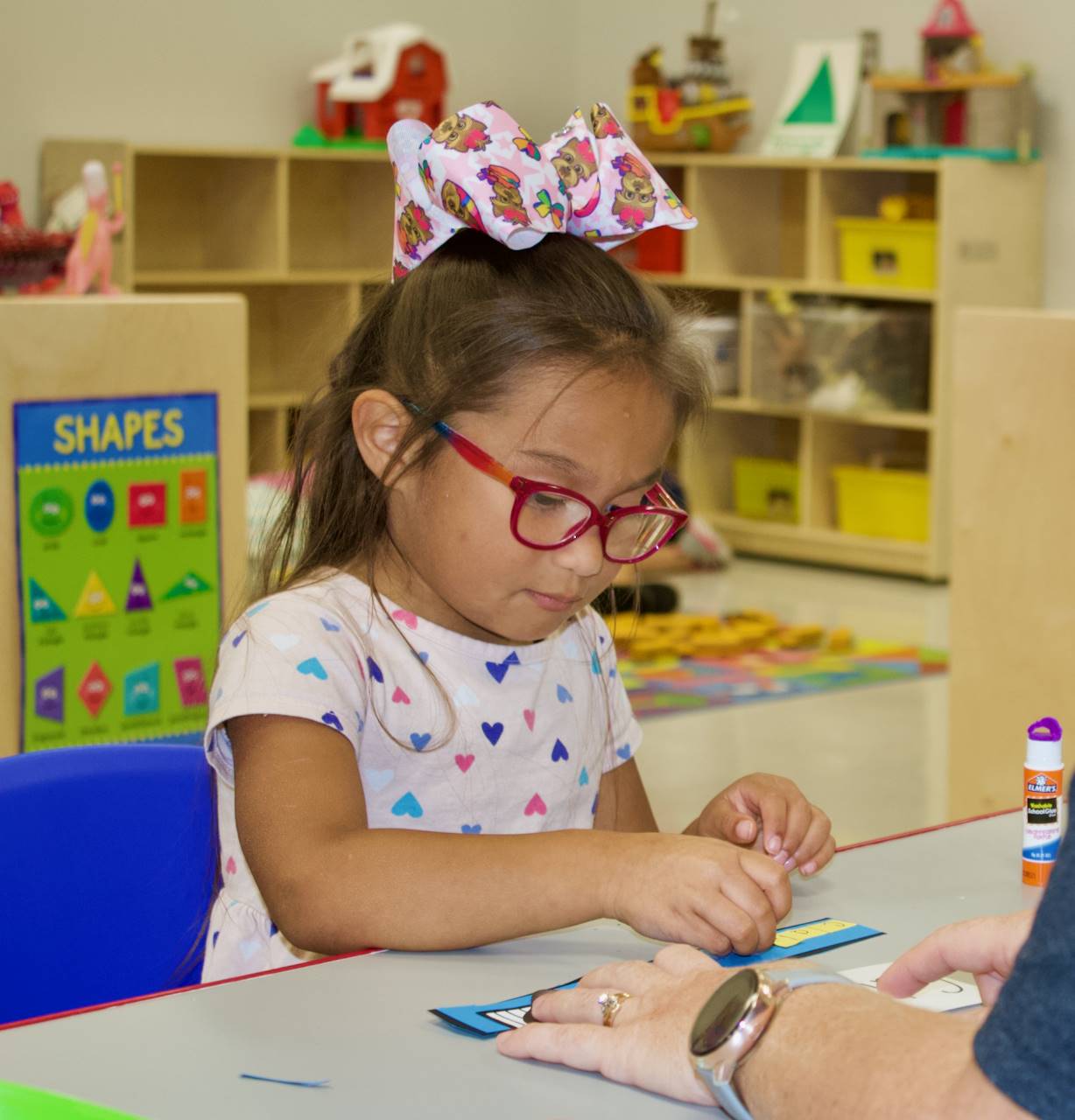 preschool girl in class