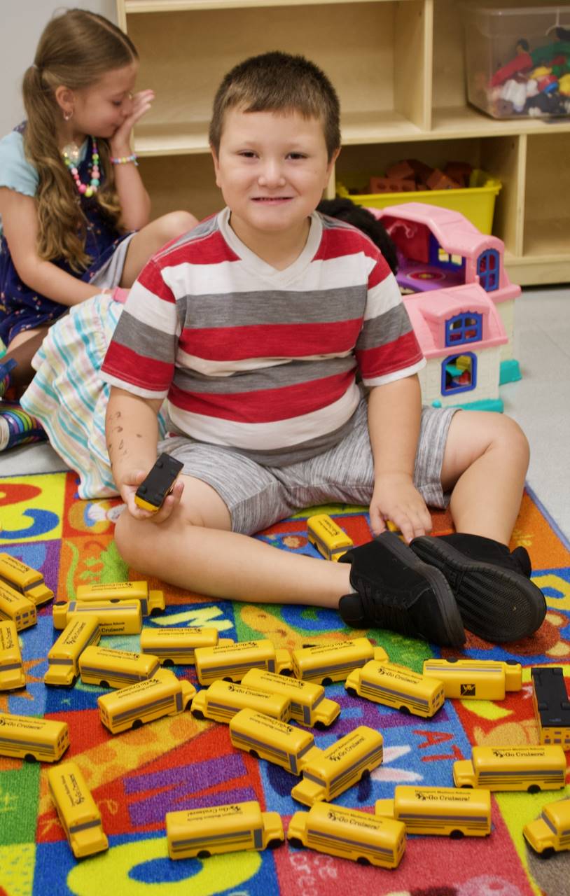 preschool boy with toys