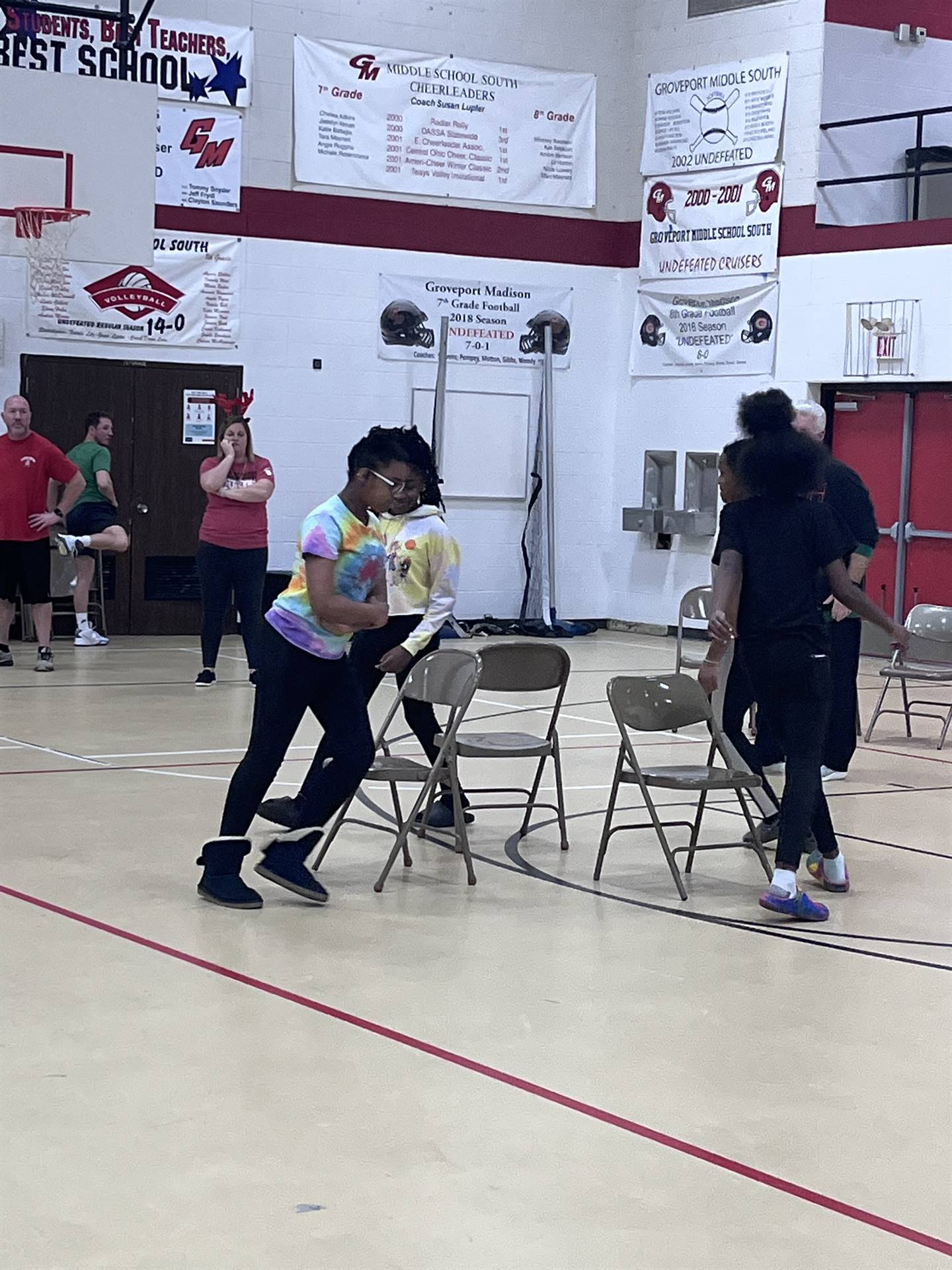 students playing musical chairs