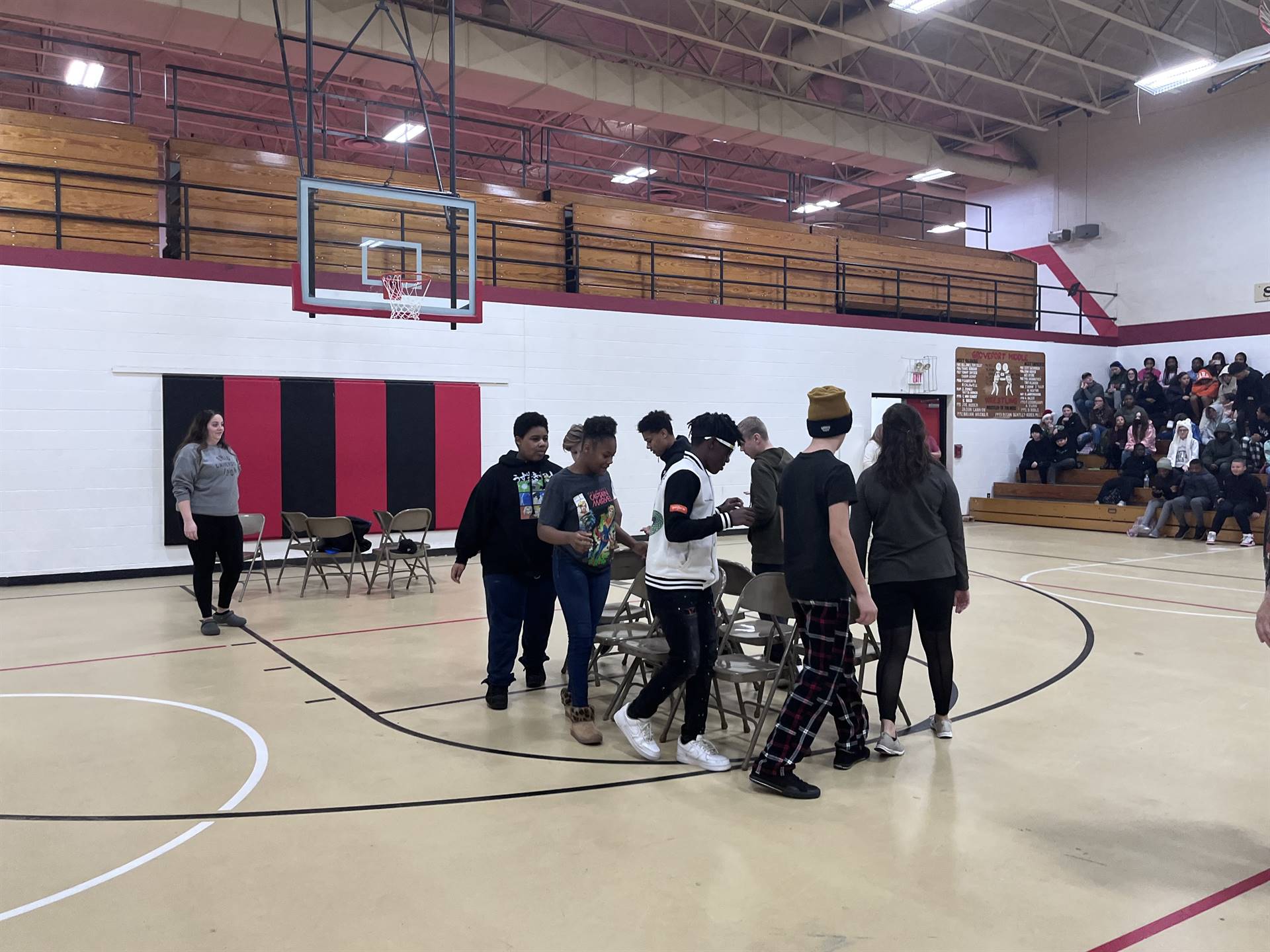 students playing musical chairs