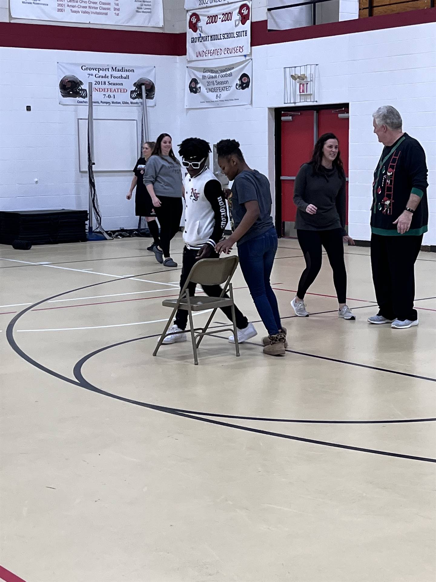 students playing musical chairs