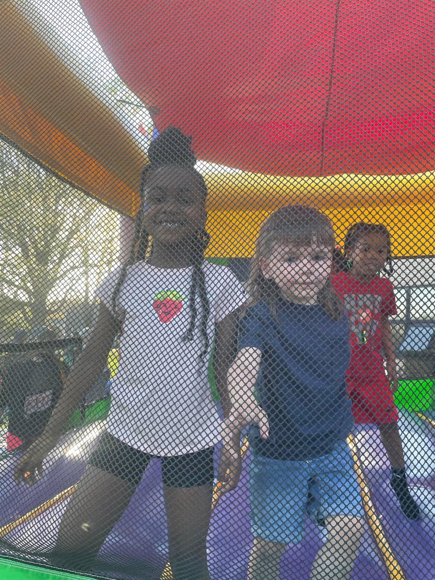 Students in bounce house