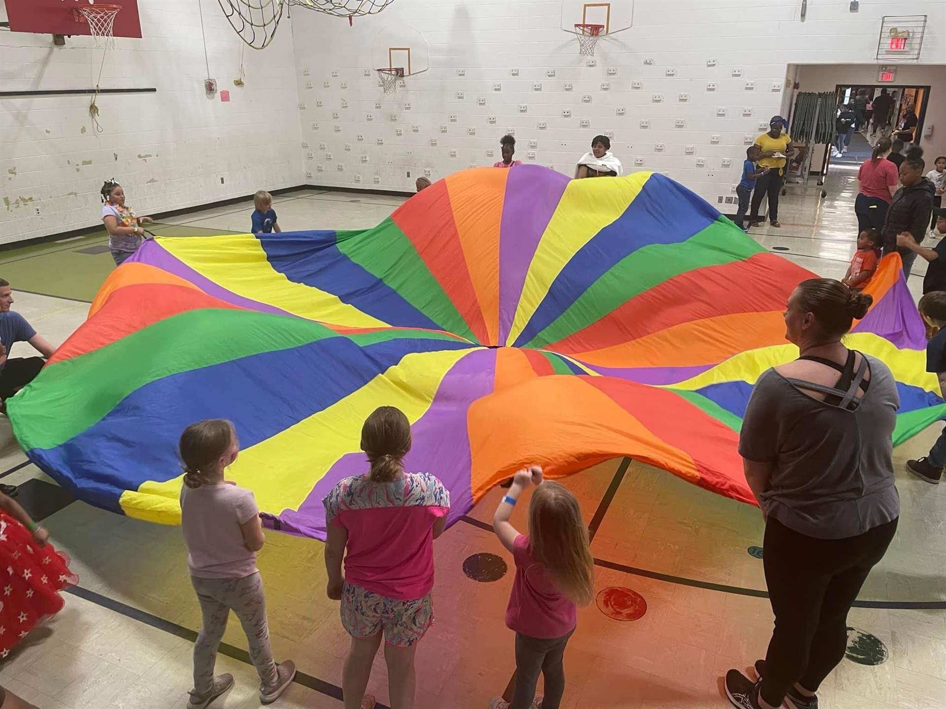 Students and parachute