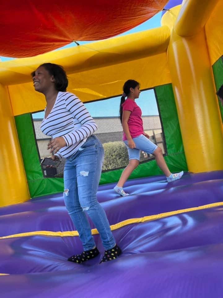 Students in bounce house