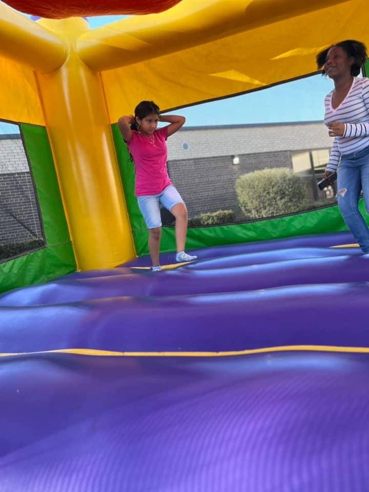 Students in bounce house
