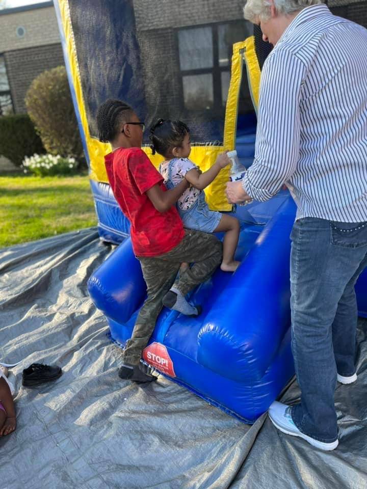 Students in bounce house