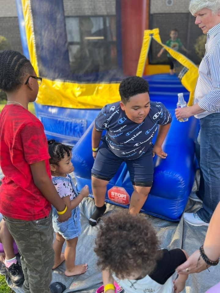 Students in bounce house