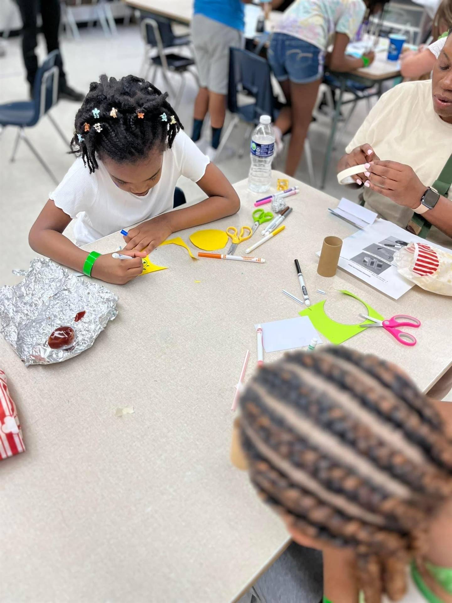 Students making a craft