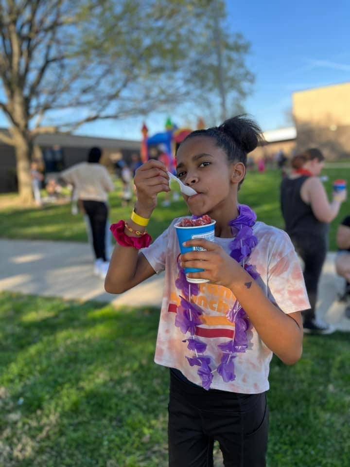 Student enjoying a cold treat