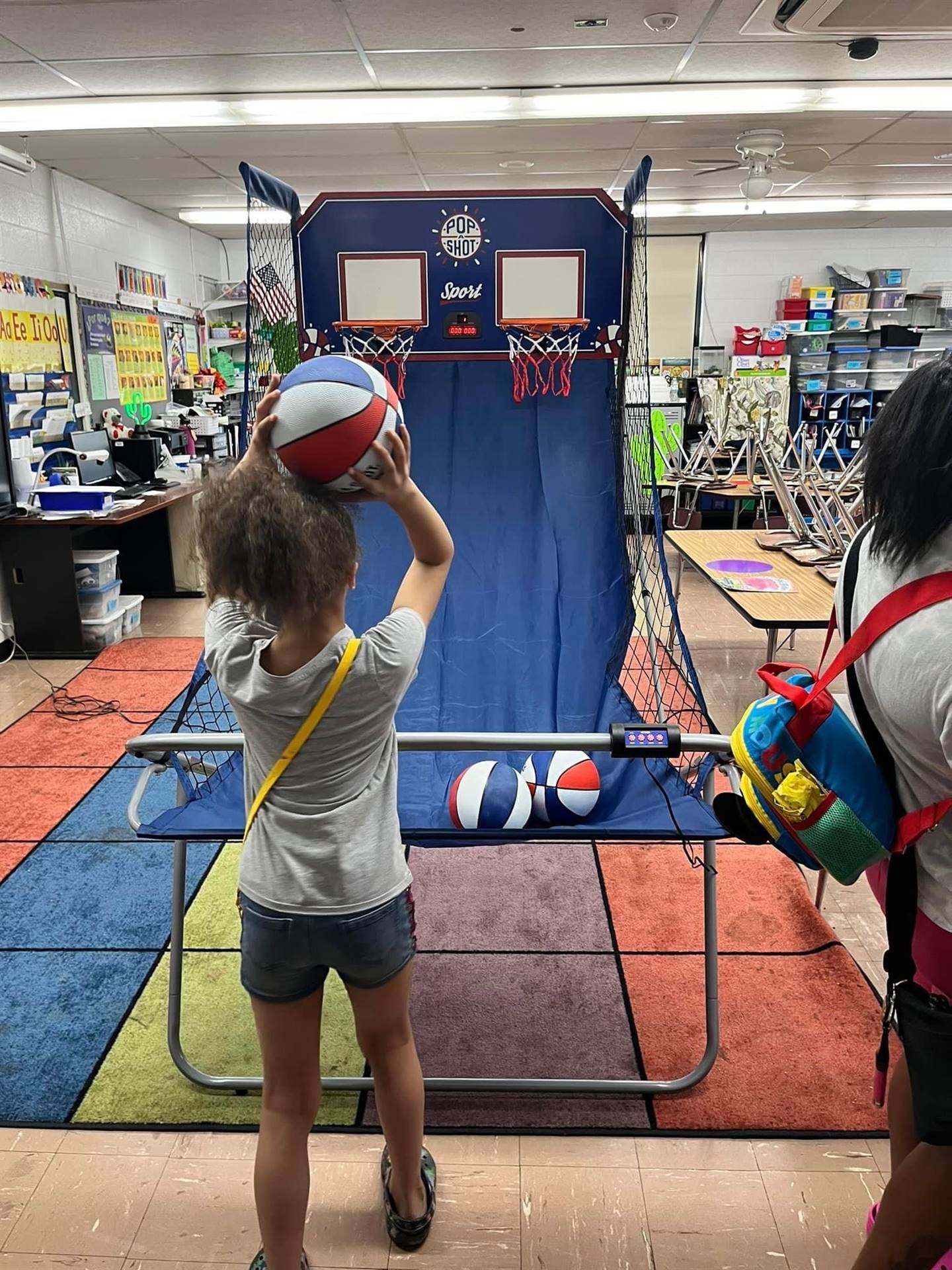 Student playing basketball