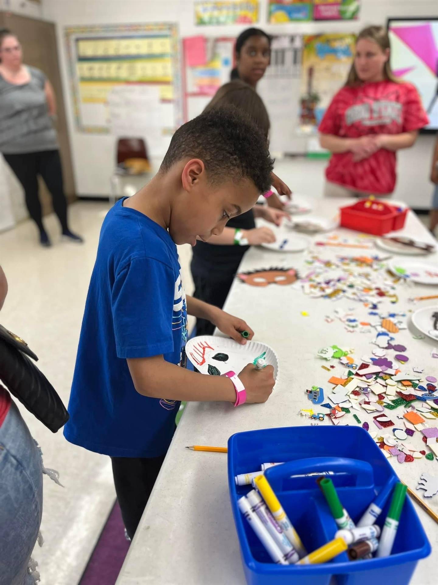 Student making a craft