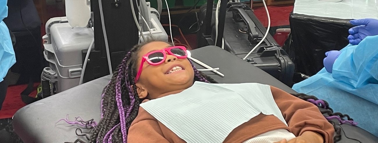 student visiting the Mobile Dentist at school